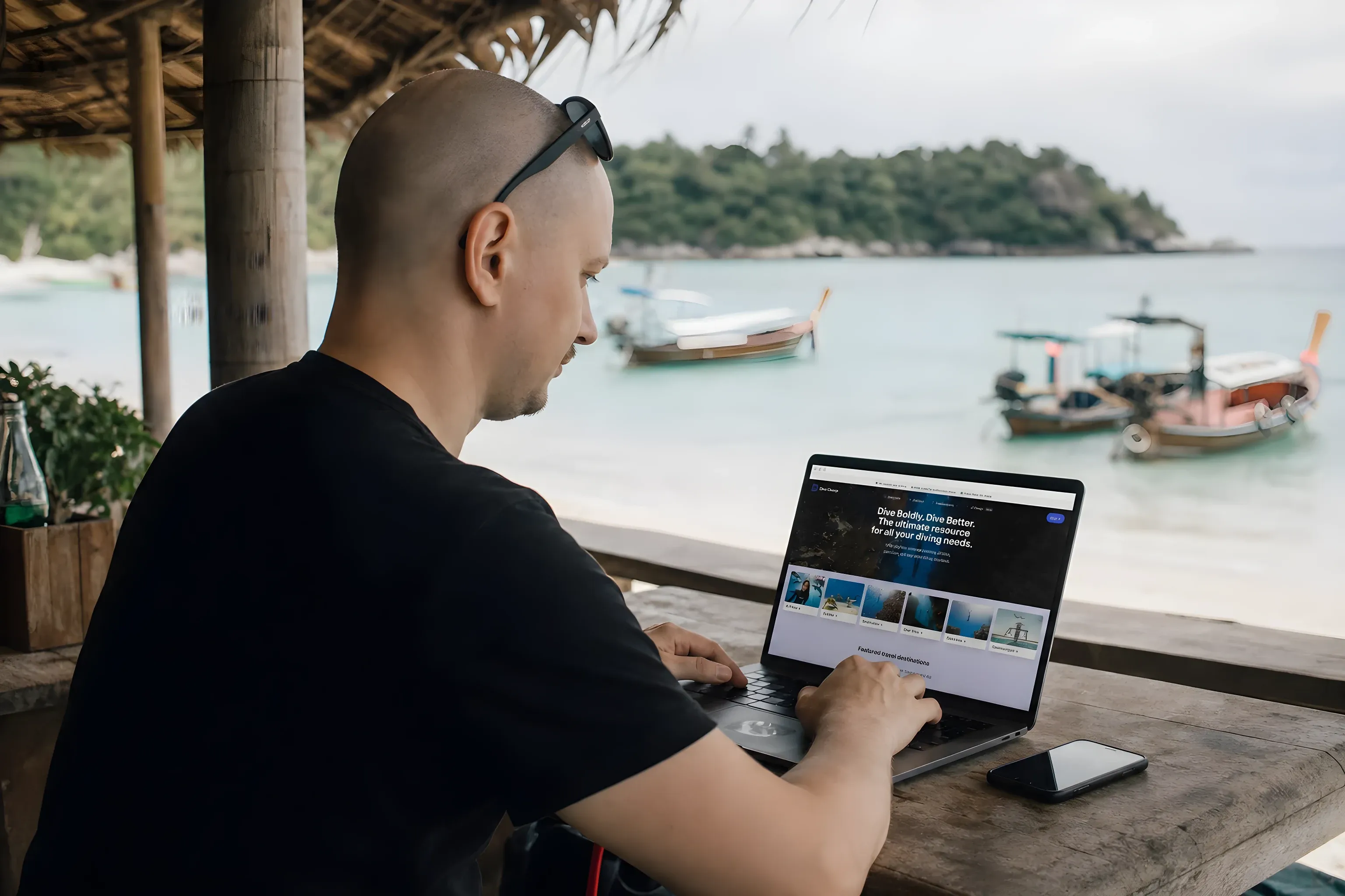 Me working on DiveChamp from a beach bar on a Thai island