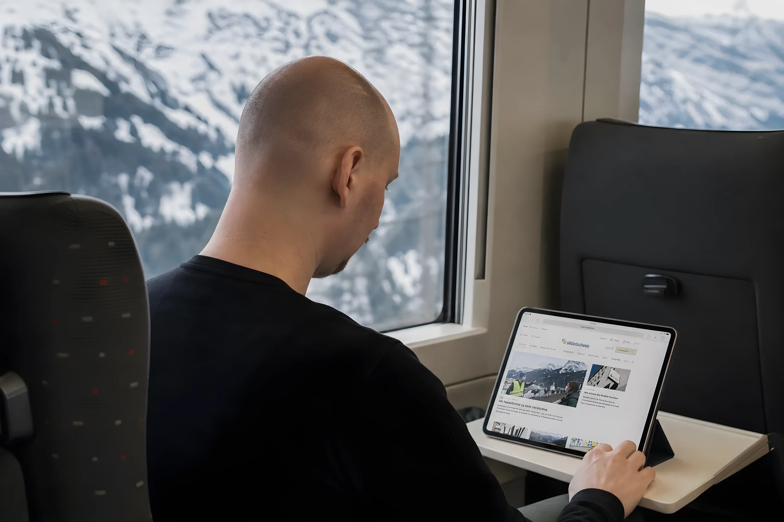 Me checking the Südostschweiz site on an iPad on a Swiss train
