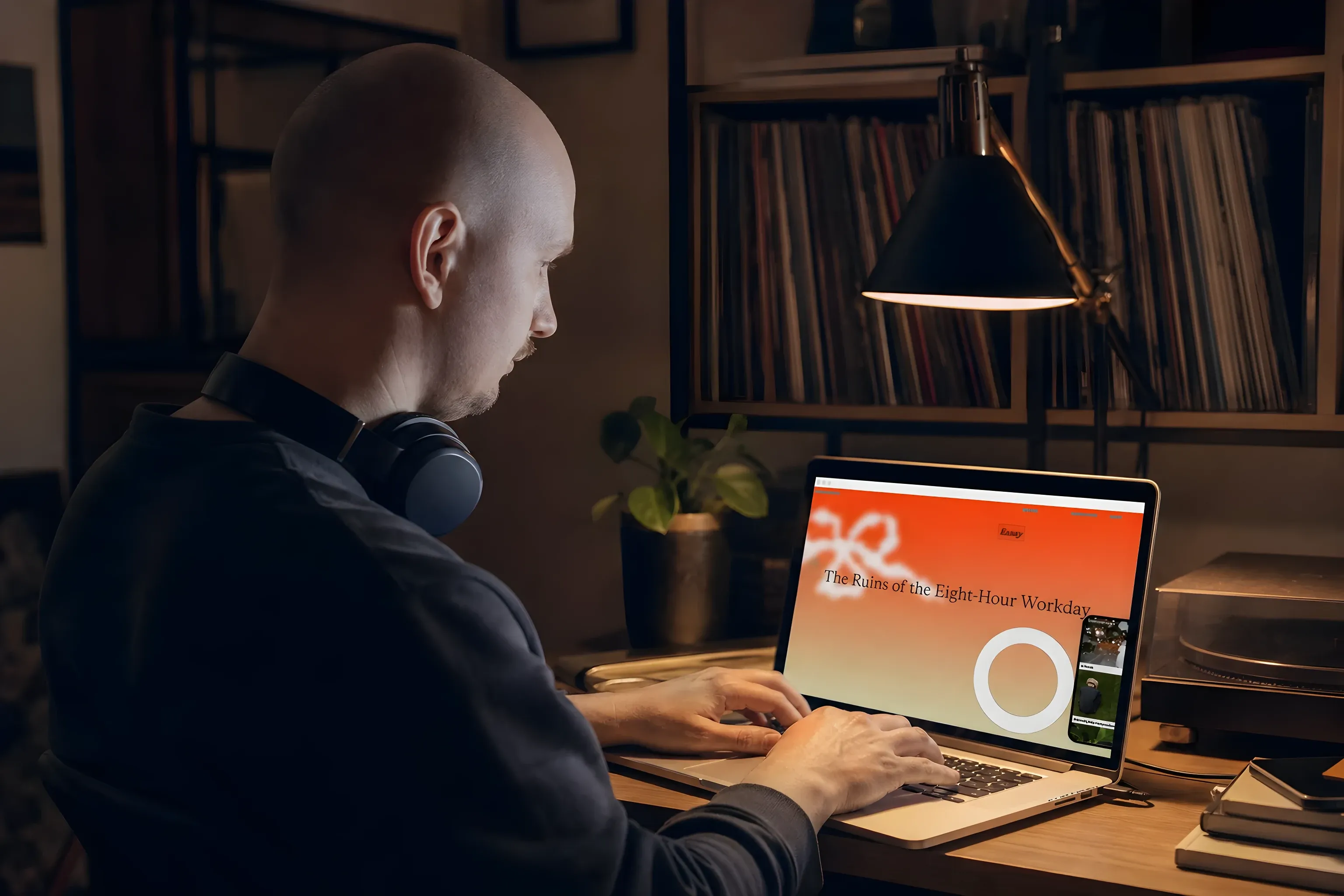 Me working on the V/A site in the evening, headphones around my neck